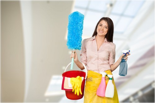 Cleaner treating a carpeted hallway in Barnes property