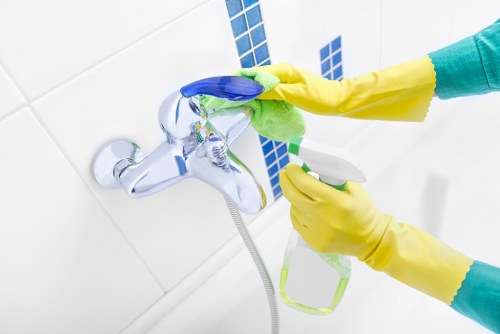 Professional cleaners maintaining a Barnes retail front and customer-facing area